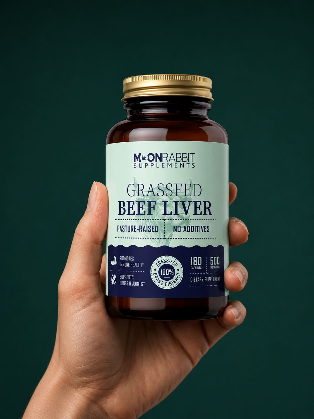 Hand holding Moon Rabbit Supplements beef liver capsules