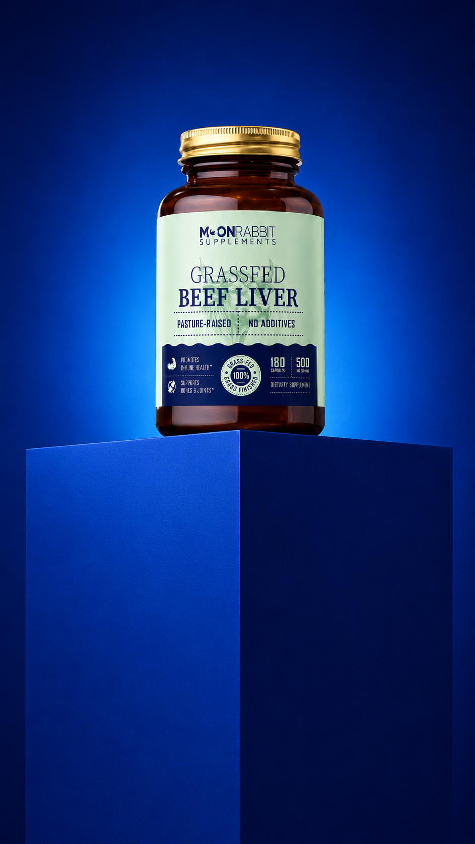 Bottle of grassfed beef liver supplement on a blue platform with a blue background